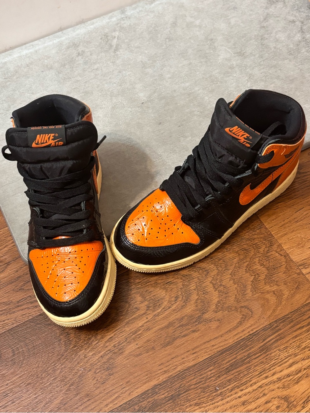 Nike Air Jordan 1 High Black and Orange Leather Sneakers